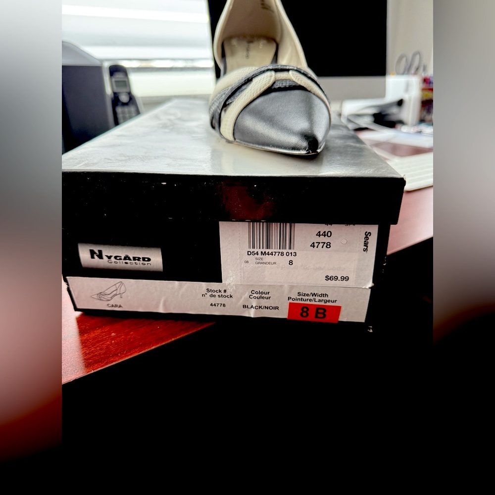 Black and White heels. Brand new. Never worn.